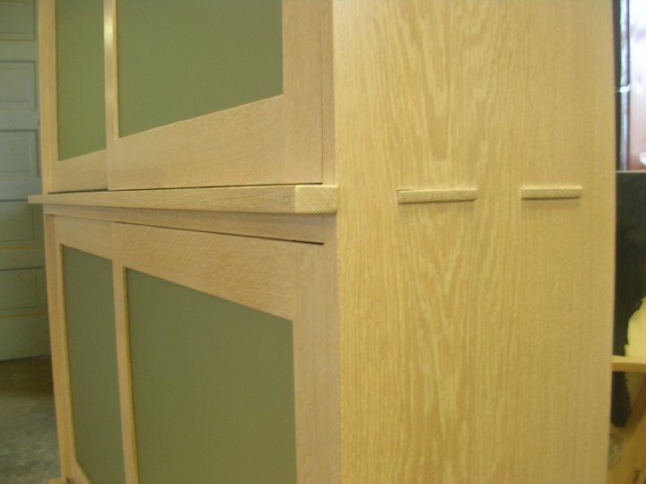Mortis and tenon white oak linen cabinet with sliding doors by Nolan Wallenfang Custom Woodwork, Green Lake Wisconsin WI